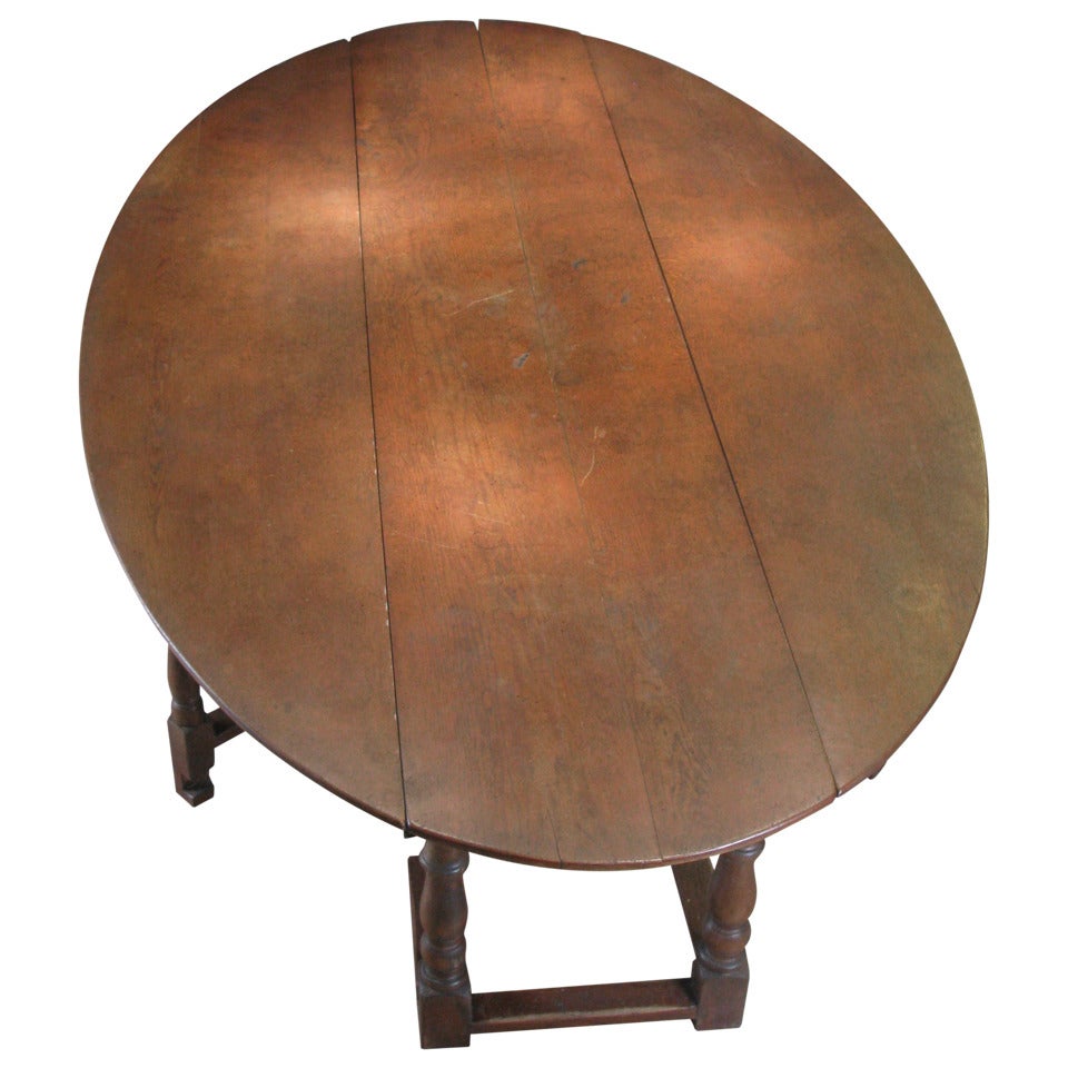 Antique English Oak Drop Leaf Oval Table