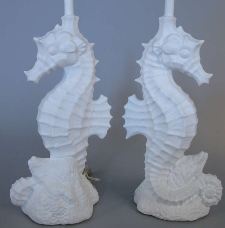 a pair of very charming and beaitful plaster table lamps c. 1940 in the form of starfish. very nice details, finished in white.