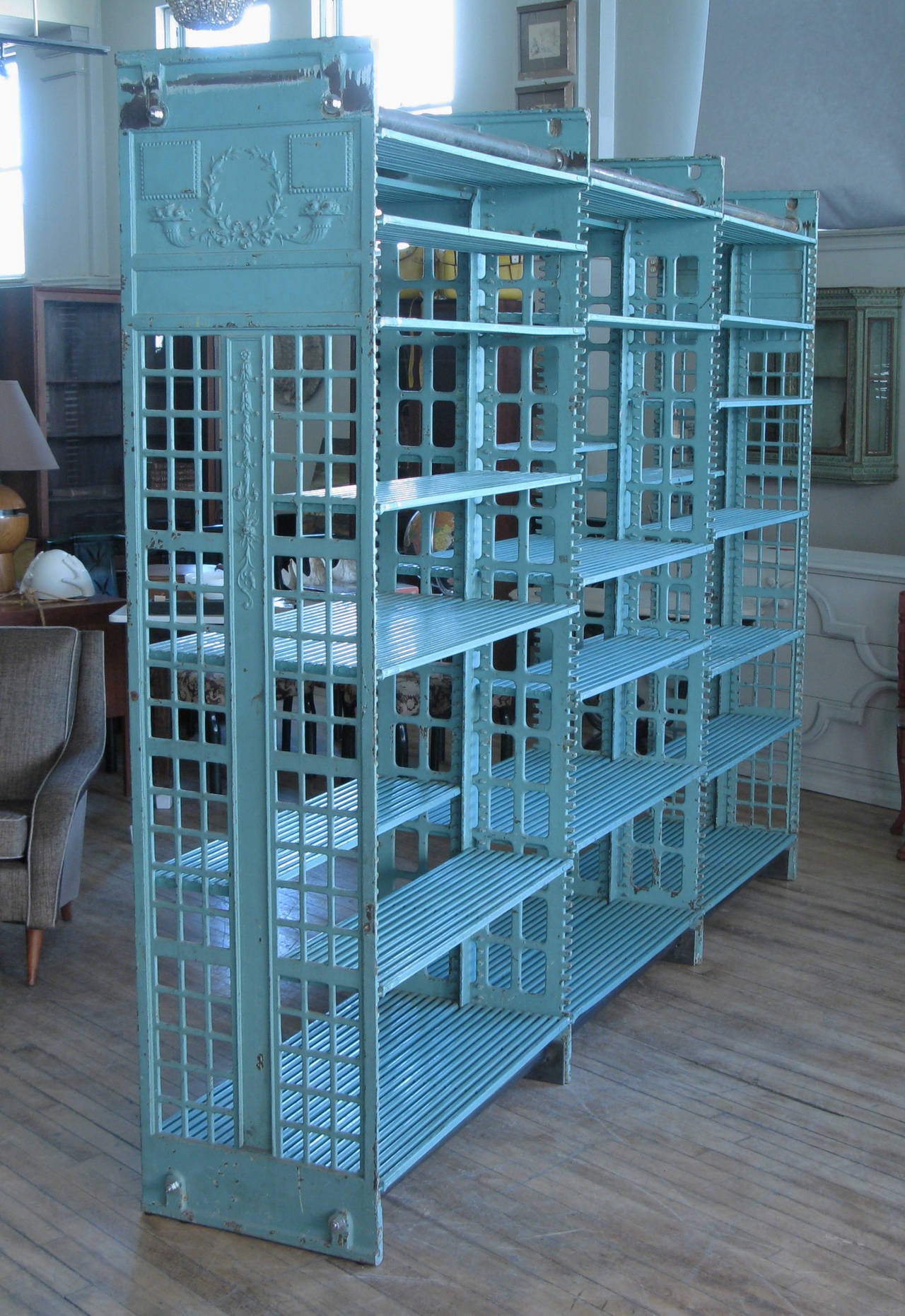 A rare set of antique cast iron archival library bookcases by Snead & Co. These impressive cast iron bookcases with adjustable steel shelves were the standard in the late 19th and early 20th century for library and archival storage, and were used by