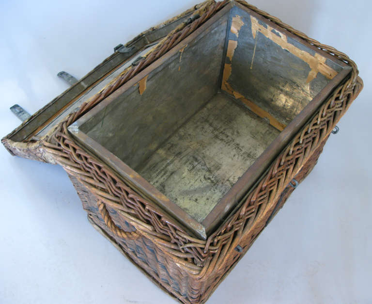 Antique Rattan and Cast Iron Trunk 1