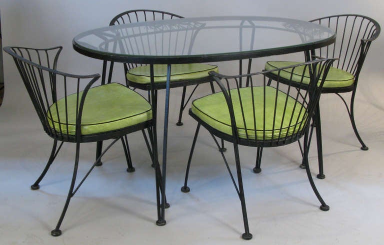 wrought iron oval table and chairs