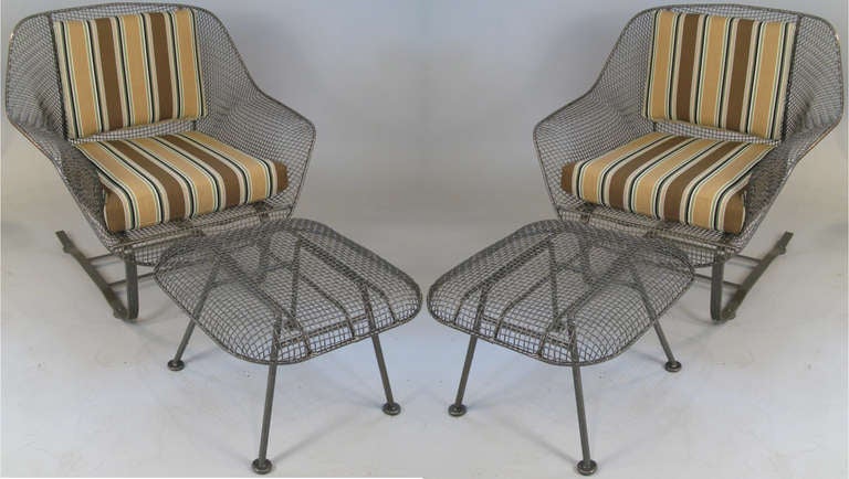 a matched pair of vintage 1950's 'Sculptura' garden lounge chairs with spring bases by Russell Woodard. these are the most comfortable and relaxing of the Sculptura series. low wide chair with a gently rocking base. together with a pair of matching