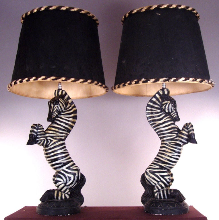 an exceptional pair of vintage 1940's Standing Zebra Lamps in handpainted plaster. fantastic form and detials. rewired with double chrome sockets. <br />
<br />
<br />
key: james mont