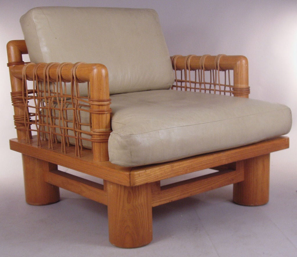 a rare pair of vintage 'Dowelwood' lounge chairs by Karl Springer. exaggerated scale and proportions, raised on 6
