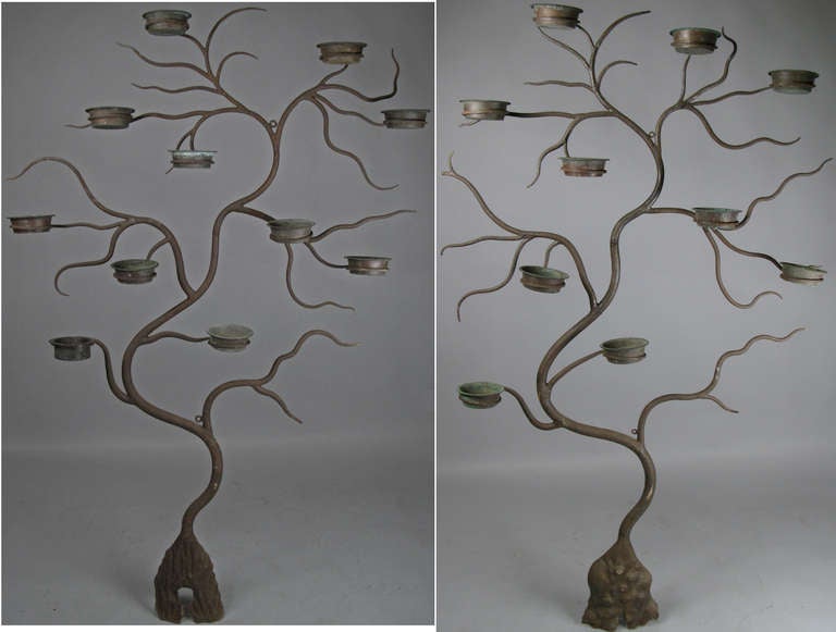 an amazing pair of antique wall mounted tree form plant stands, made in heavy wrought iron with beautiful copper trays for the planters to rest in. wonderful design - the trees are similar in form but each is slightly different. these came out of a