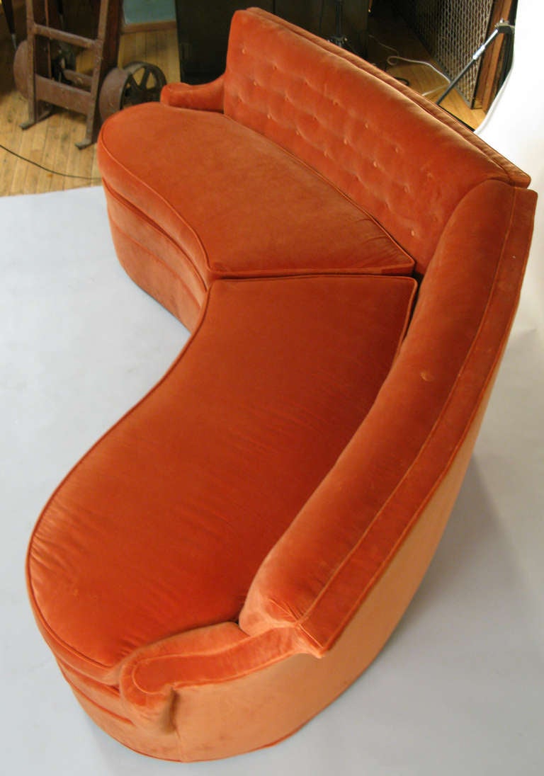 curved orange sofa