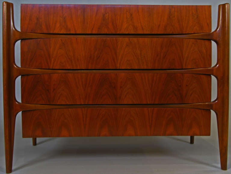 A rare chest with a very unique exposed frame designed by Edmund Spence circa 1950. beautiful design with slightly curved front and four drawers. made in Sweden.