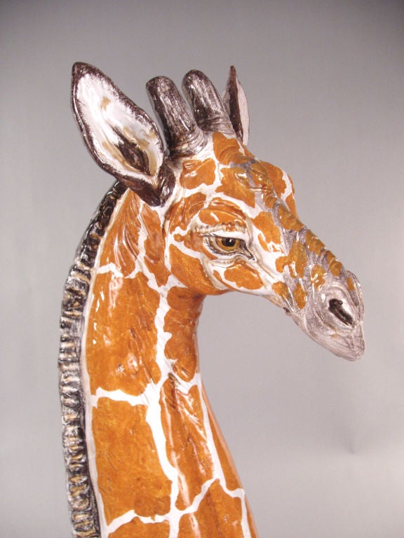a very nicely finished ceramic hand painted Giraffe.