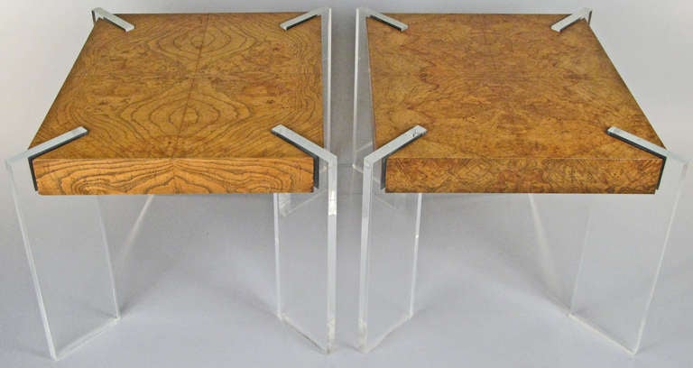a pair of vintage lamp tables by Vladimir Kagan, in beautifully figured burled elm with lucite legs at corner angles.