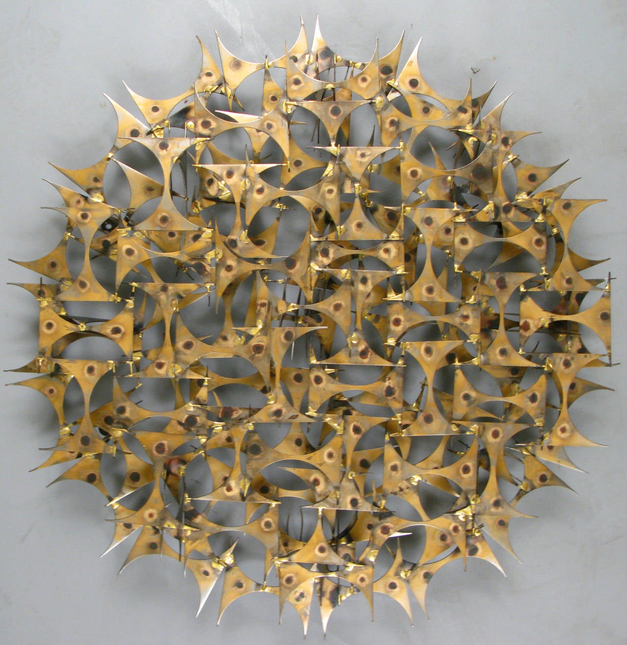 vintage welded and burnished steel wall sculpture titled 