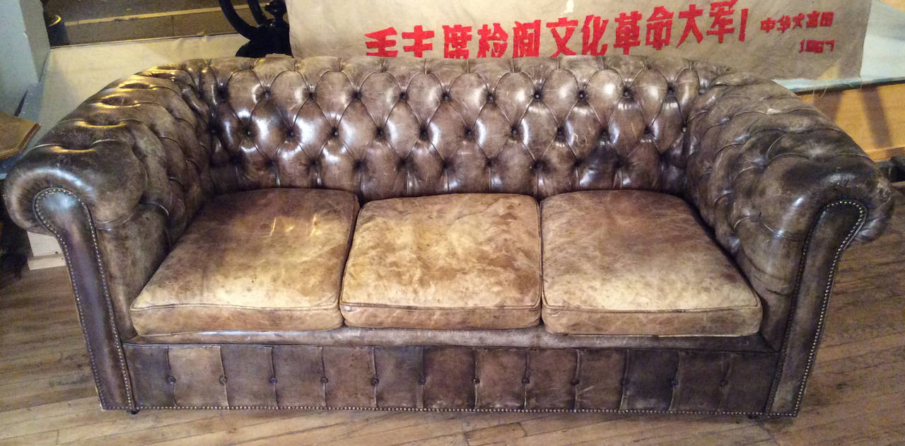 vintage tufted leather sofa