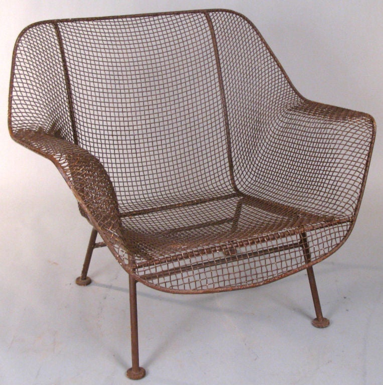 a pair of Woodards classic and iconic 1950's 'Sculptura' lounge chairs in steel mesh with iron bases. these are the largest and most comfortable of Woodards collection of lounge seating. price includes finish color of choice.