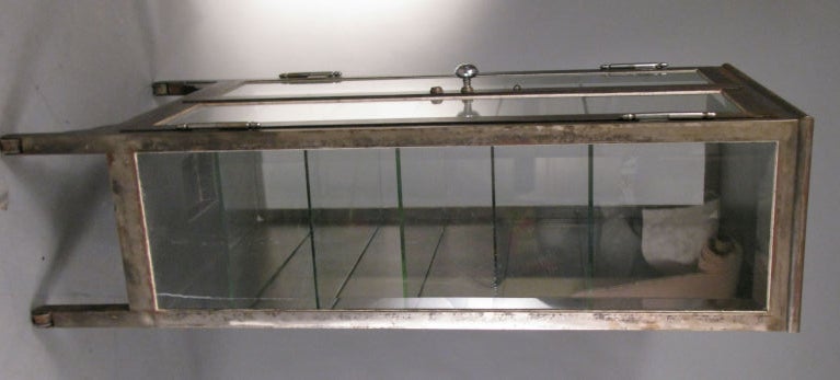 apothecary glass cabinet