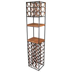 The Thirty Bottle Wine Rack in Iron 
Leather by Arthur Umanoff