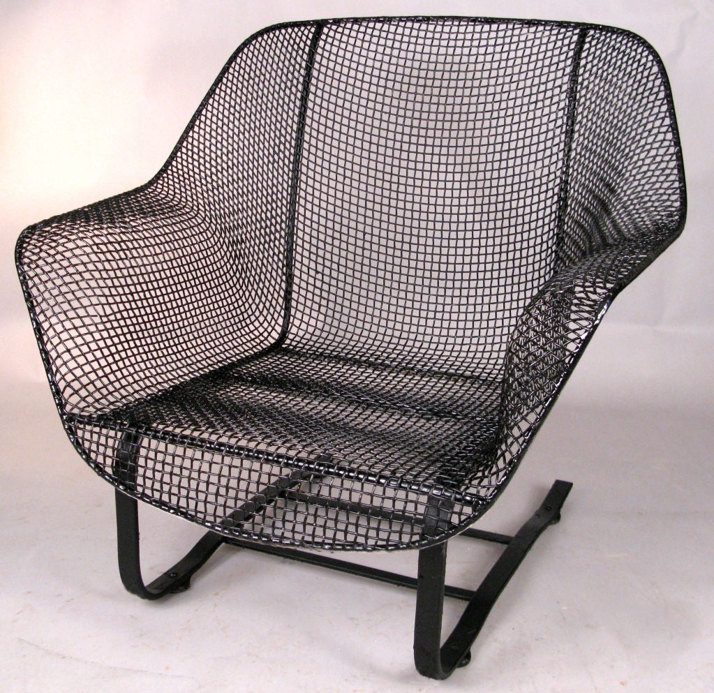 the most comfortable and desirable of Russell Woodard's classic and iconic 'Sculptura' collection, the spring lounge chair is formed entirely of woven steel mesh, mounted on a spring base of wrought iron. wonderful form and extremely comfortable and