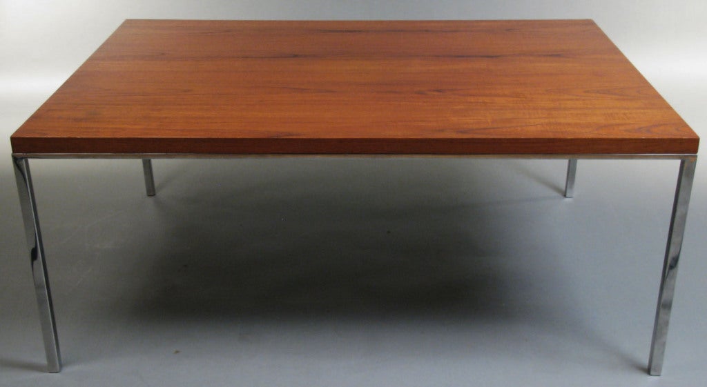 a very handsome vintage 1950's walnut cocktail table by Harvey Probber. beautiful simple form with a large rectangular top and slim chromed steel legs. 

