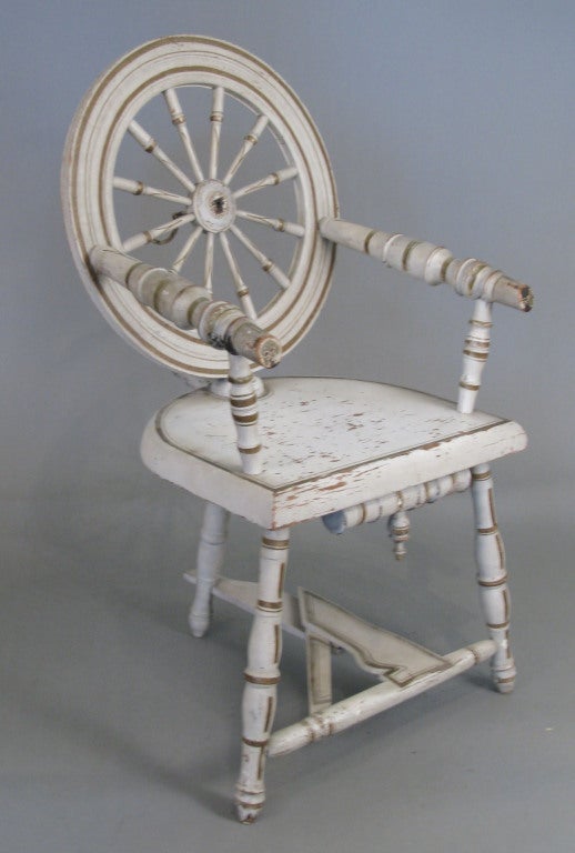 a delightful antique decorative chair composed from an antique spinning wheel. discovered in coastal Maine and loaded with character. a lovely piece!