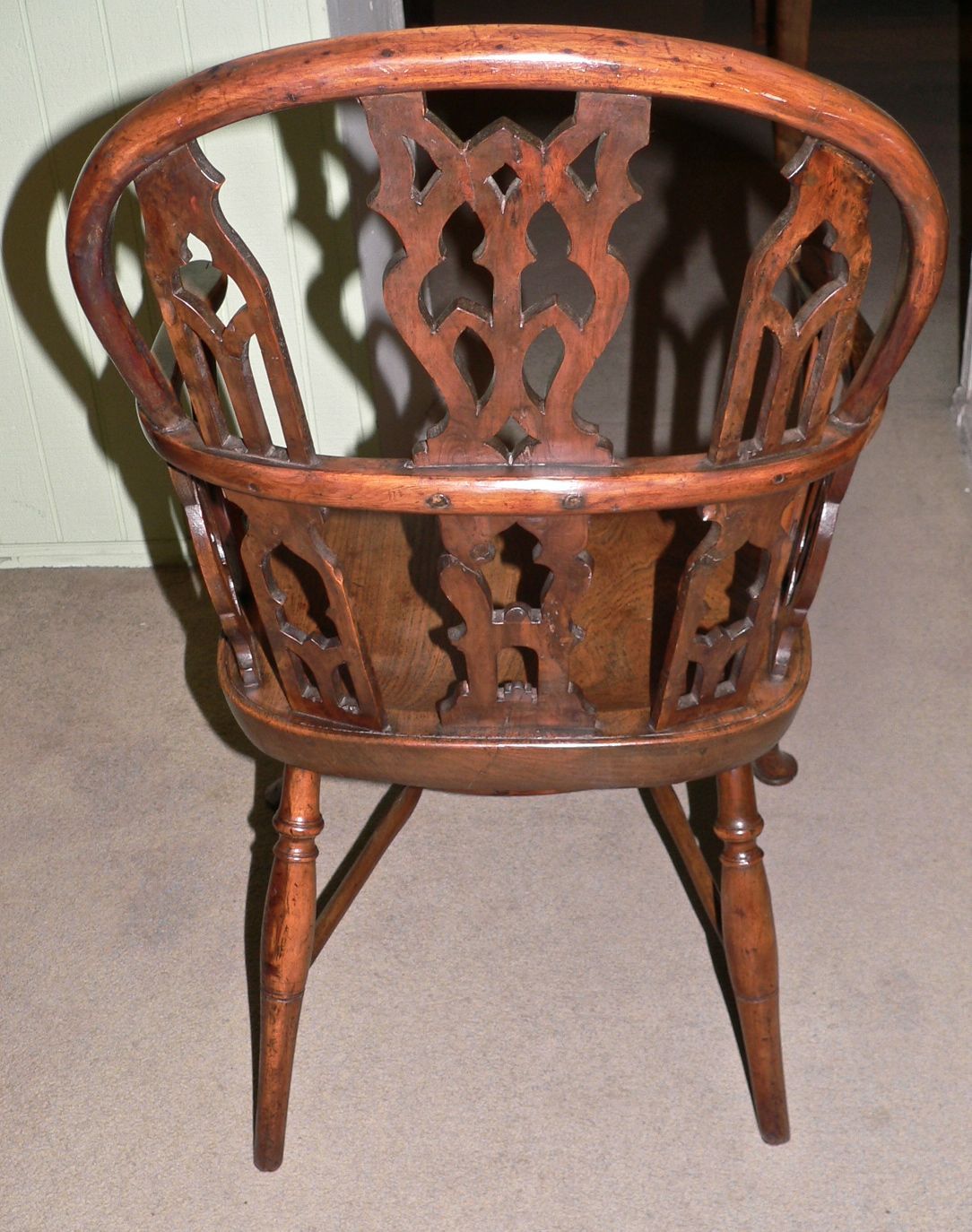 Made in the Thames Valley and dating from 1740-1780, this fabulous quality double hoop Gothic Windsor chair is made of very pretty yew wood with an elm seat. It has cabriole legs, Gothic splats and a crinoline stretcher. According to our reference