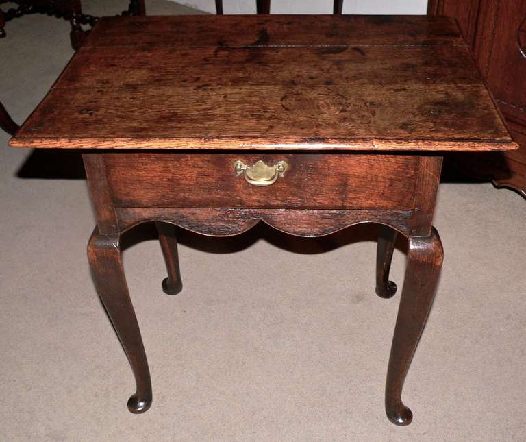 This low boy dates from about 1730 and has great color and patina. A very good example of a country piece with 