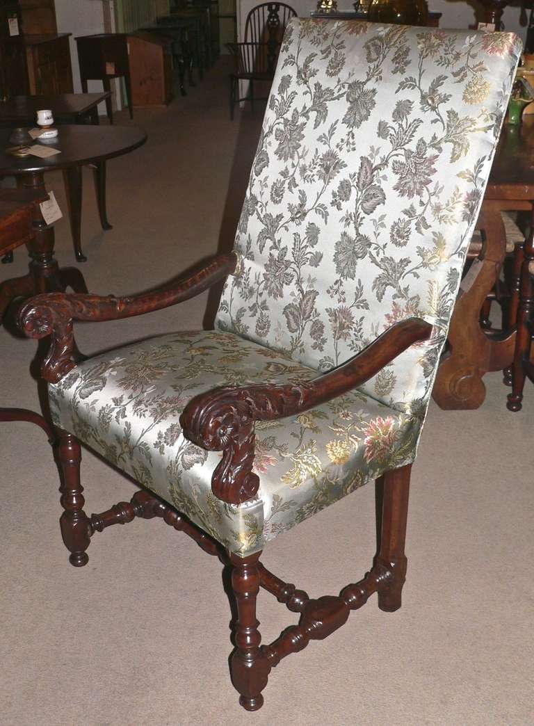 This chair dates from about 1775 and has a great patina. It is solid in excellent condition with newish upholstery and has a fine quaility of carving to the arms.