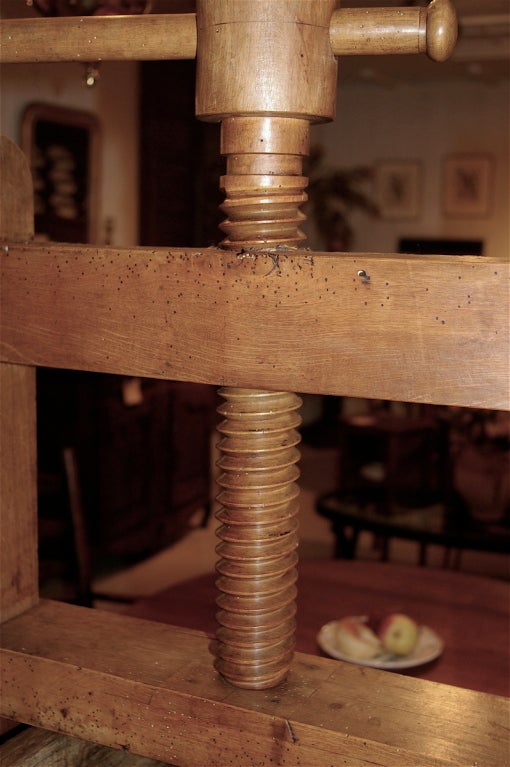 Purchased in Beaune, this fairly large scale fruit press is in beech wood and in very good condition. Most farms had their own small scale distilling operations.  Great decorative addition to a wine cellar.