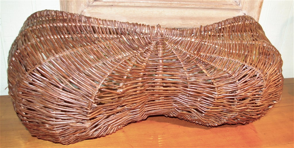 Quite rare to find one of these types of baskets made for a child. This basket comes from the vineyards of the Cote d'Or  around Beaune. The wicker is tight and the handle is very solid.