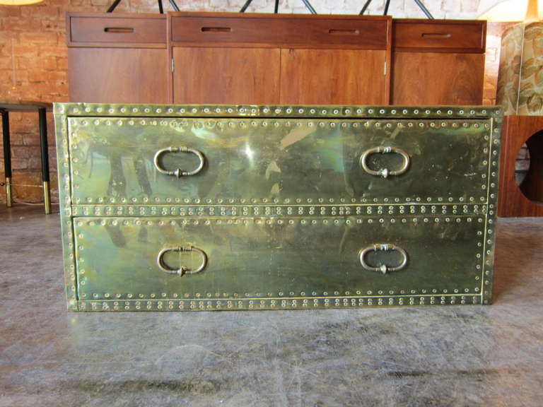 A studded brass chest by Sarreid Ltd.. Could also be used as a coffee table.
