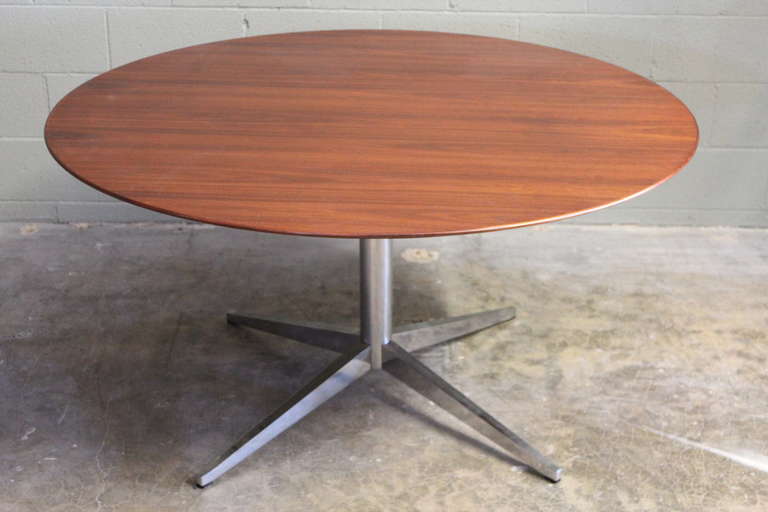 A classic Florence Knoll design with walnut knife edge top.