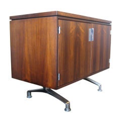 Small rosewood cabinet with chrome legs