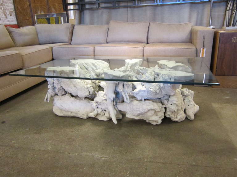 White lacquered organic tree root coffee table.