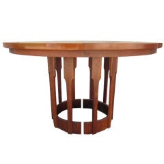 Walnut dining table by Brown Saltman