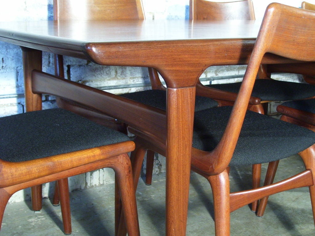 20th Century Teak Danish Modern Draw Leaf Dining Table and Eight Chairs
