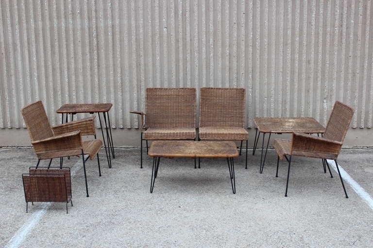 A rare and iconic patio set by Van Keppel Green. The set consists of  an armchair, three piece sofa, magazine rack and three tables. If you have any questions about this item or about shipping, please contact dealer.