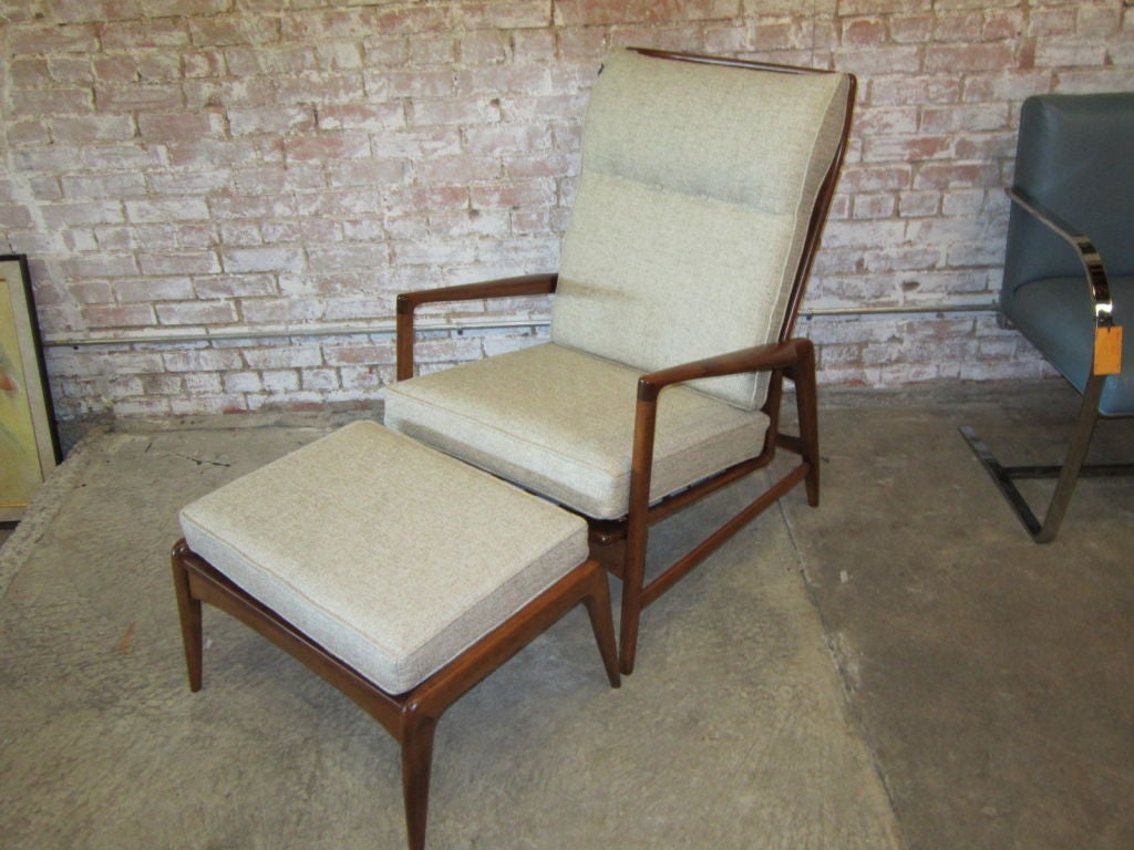 Elegant four position recliner imported by Selig.