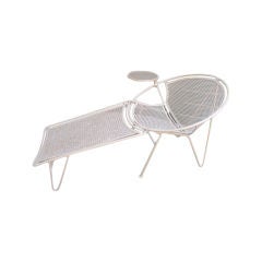 Rare outdoor chaise lounge with attached table by Salterini