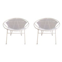 A pair of outdoor lounge chairs by Salterini