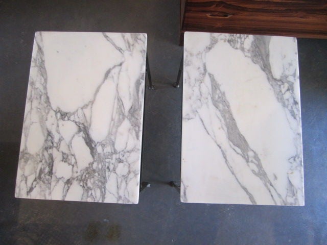 A pair of side tables by Salterini