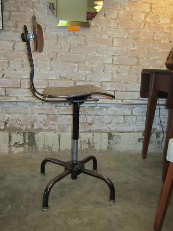 Height adjustable 1940's Toledo drafting stool with back.