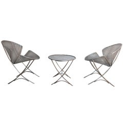 Pair of clam chairs and table by Salterini