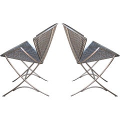 Pair of clam chairs by Salterini