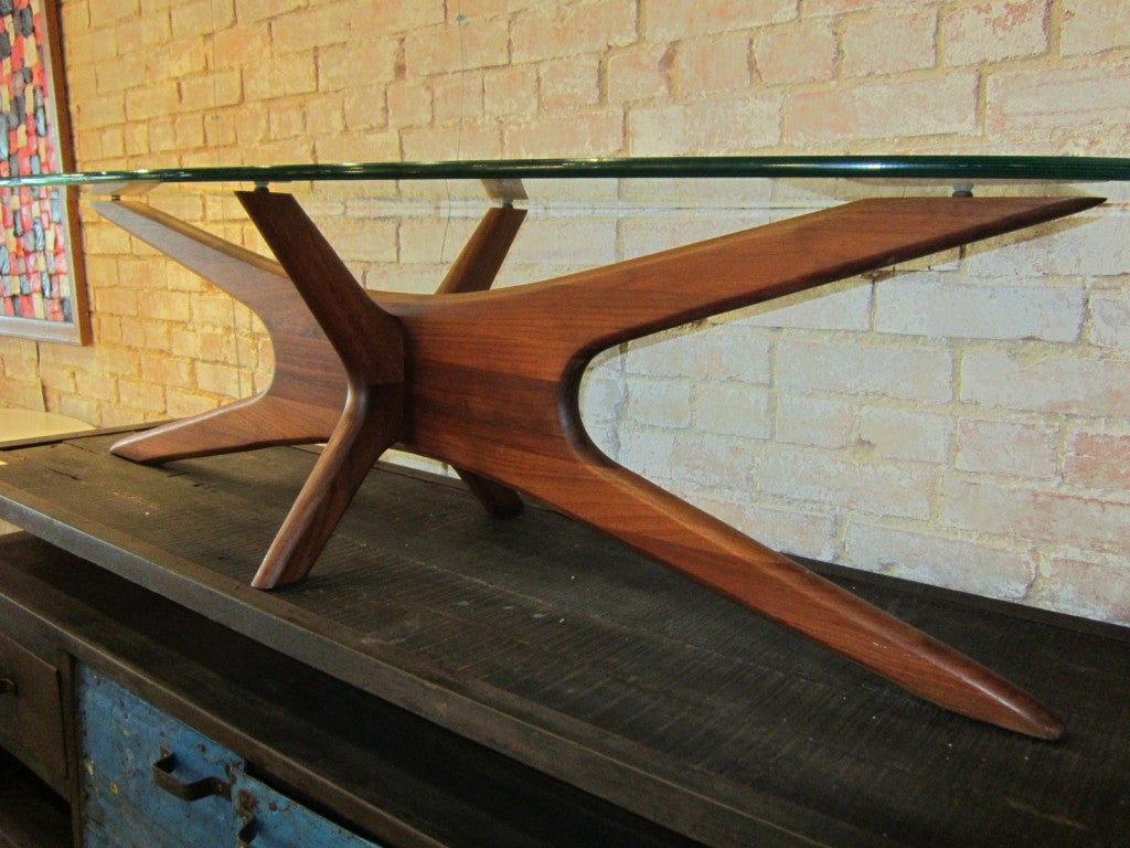 Glass topped surfboard shaped coffee table designed by Adrian Pearsall for Craft Associates.
