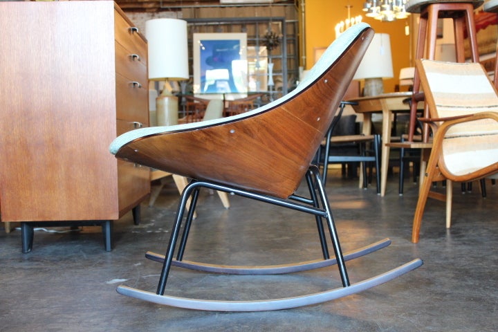 A rare rocking chair with bent plywood back and metal frame by Plycraft. New upholstery and refinished.