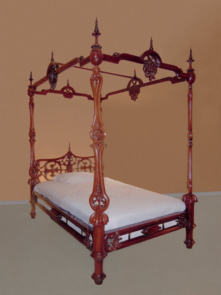 This most impressive four-poster bed will make any room into a virtual museum. The graceful lines and finely carved detail are top of the line. The Rococo style is one of the most sought after designs of the mid-19th Century. What makes this bed so