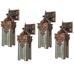 Set of Four Bronze Sconces with Lion's Heads