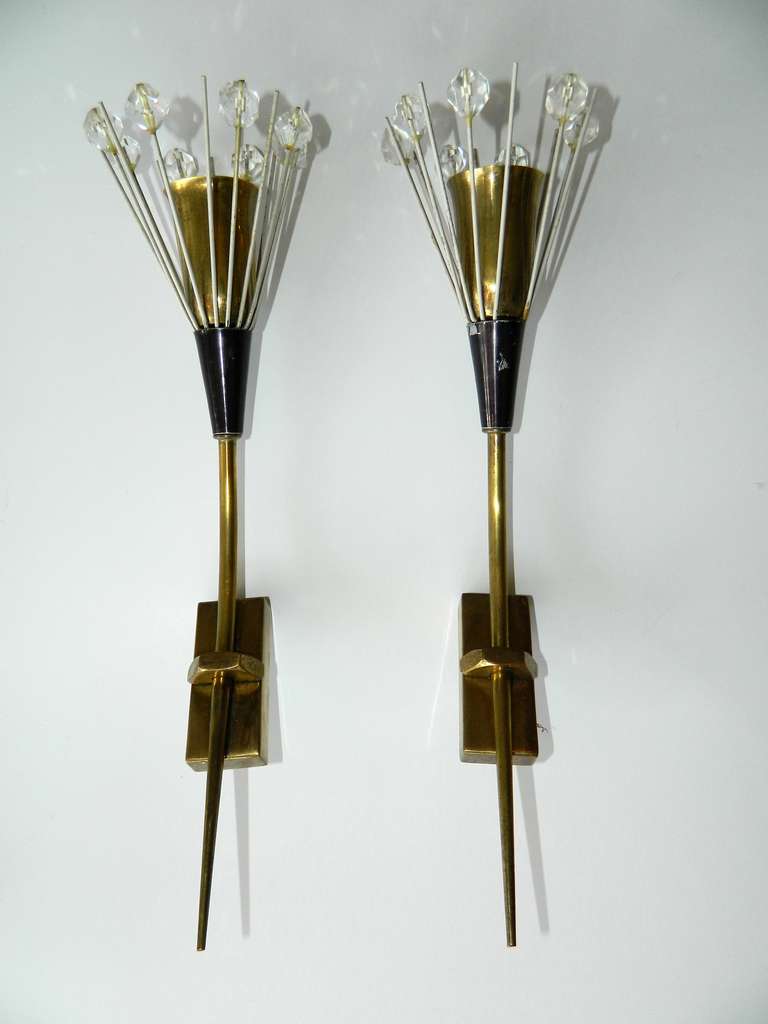 Emil Stejnar Style Pair very elegant brass sconces from Austria.
US wiring and in working condition.
Back plate: 1.5 inches W, 3 inches H.
Have a look on our impressive collection of French and Italian Mid-Century period sconces & Lighting.
More