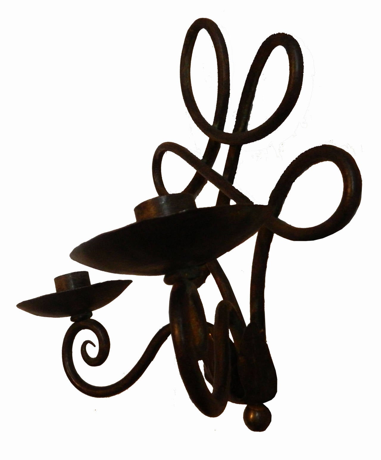 Pair of wrought iron, French, 1940s sconces, superb patina, two bulbs, 60 watts max per bulb.