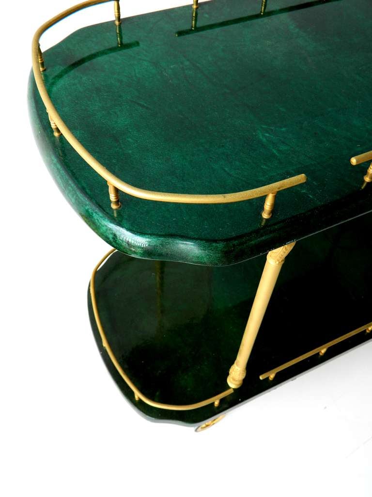  Cart / Serving  Cart,  green lacquered goatskin by Aldo Tura Italy.
Measurements : 32