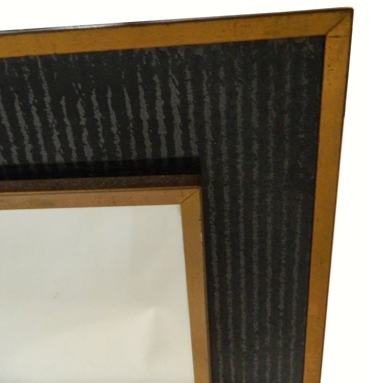 Small mirror in the style of Jacques Adnet, brass and black opaline frame.
Mirror measures: 19.5