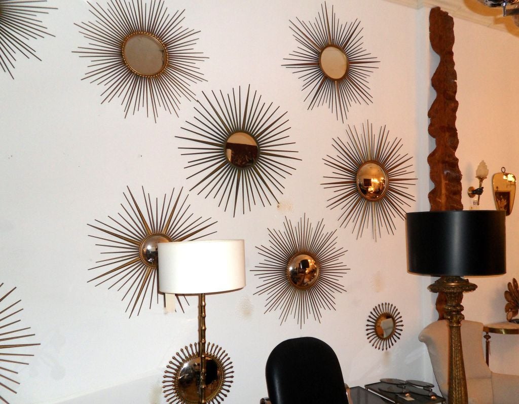 Plaqué Sunburst en laiton signé Chaty Vallauris, mi-siècle moderne  Paire de miroirs en vente