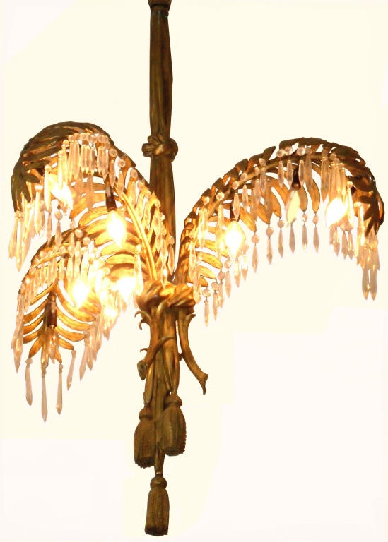 Maison BAGUES Hollywood Regency Period  Vintage Chandelier.
Solid Bronze frame with cristal tassels.
 VERY HEAVY!
3 palms, 9 lights.
Can be hung from a chain for high ceilings.
US wired and in working condition.
